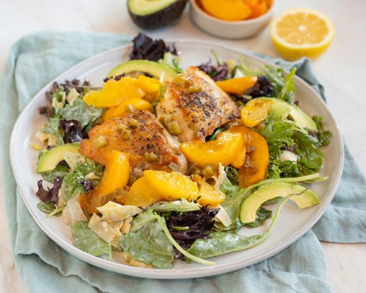 Grilled Jalapeno-Peach Chicken Thighs with Creamy Avocado & Artichoke Salad